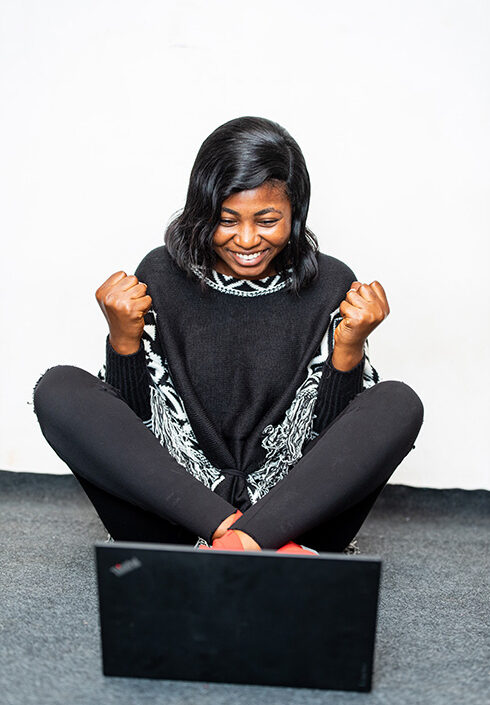 Black woman_computer Black woman looking at computer